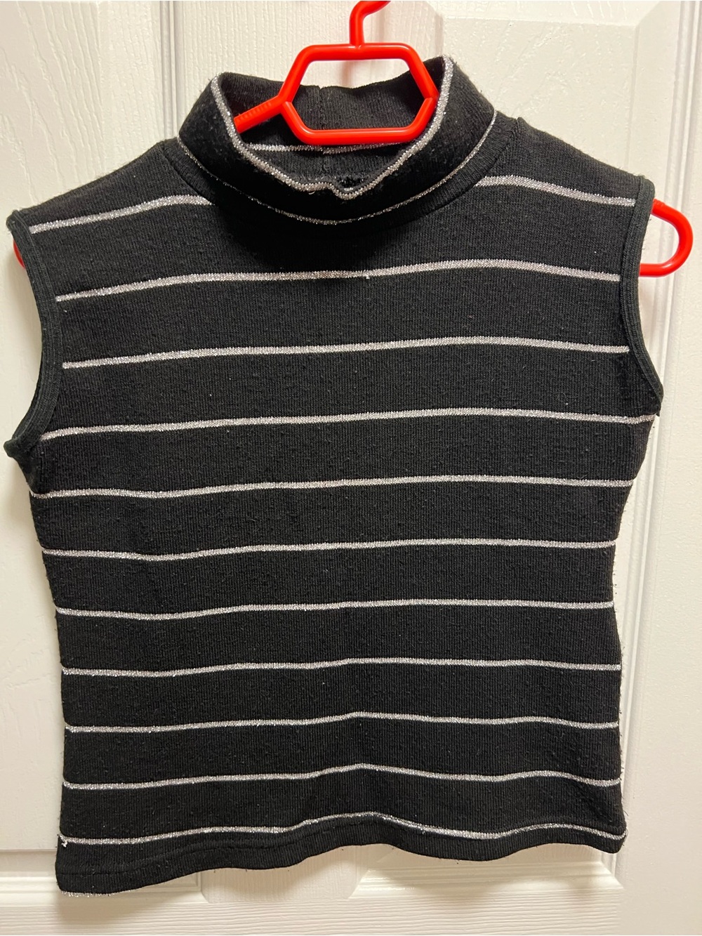 Sleeveless Black Turtleneck with Thin Gray Stripes